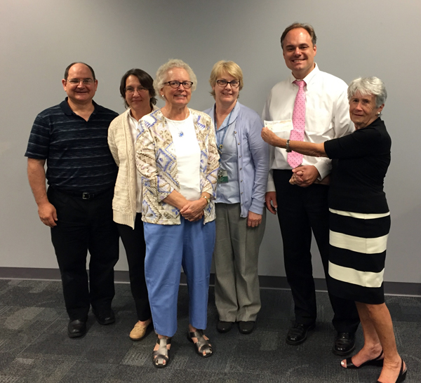 L to R: Jim Puzo, Friends; Martina Kominiarek, CEO, Bucks County Free Library; Nancy Masulis, Friends; Pat Hartman, Levittown Library Branch Manager; ?, Friends; Roberta Foerst, President, Bucks County Free Library Board